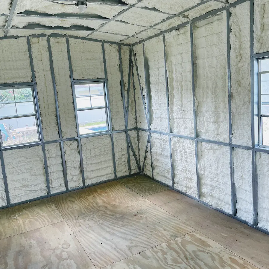 Closed-cell spray foam insulation applied to wall cavities in a residential project in Soledad